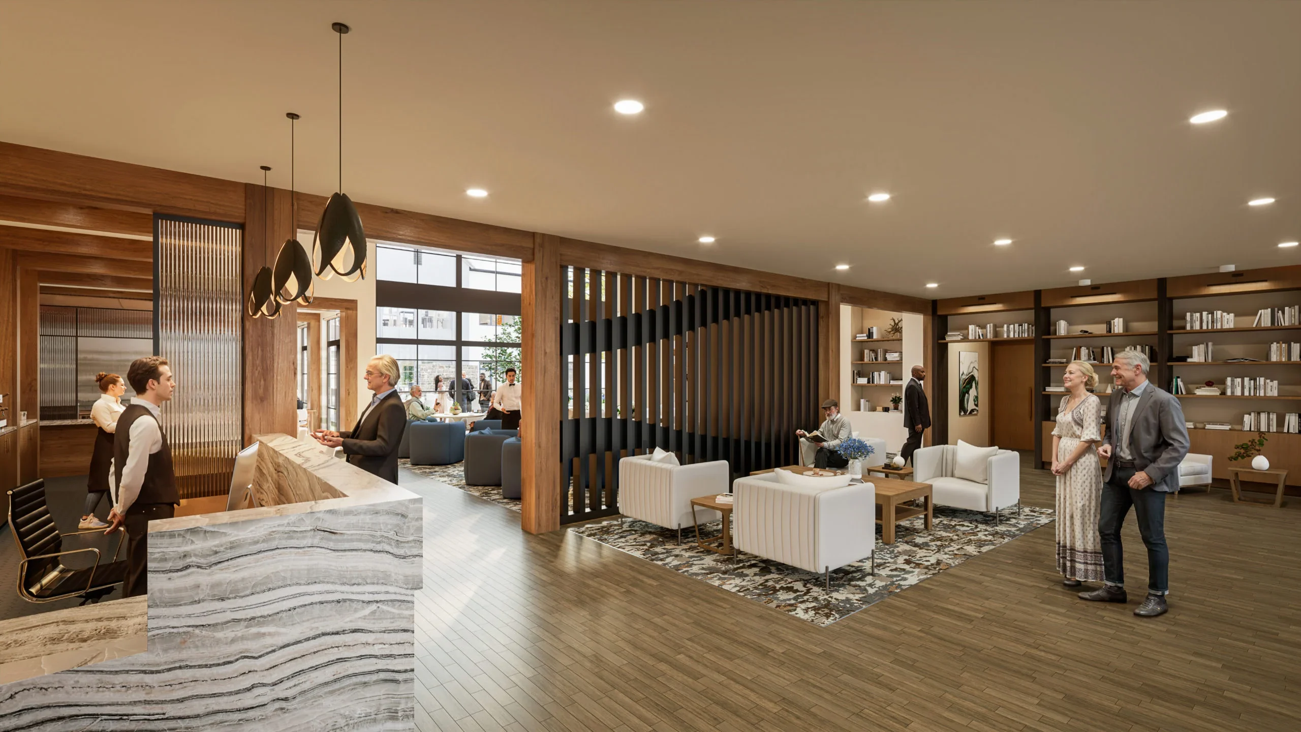 Senior living community lobby with residents and staff socializing near a reception desk and seated in comfortable seating areas.